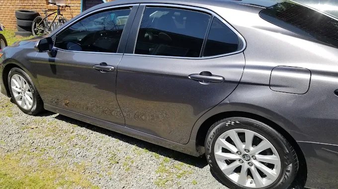 Gray Toyota Camry from the side